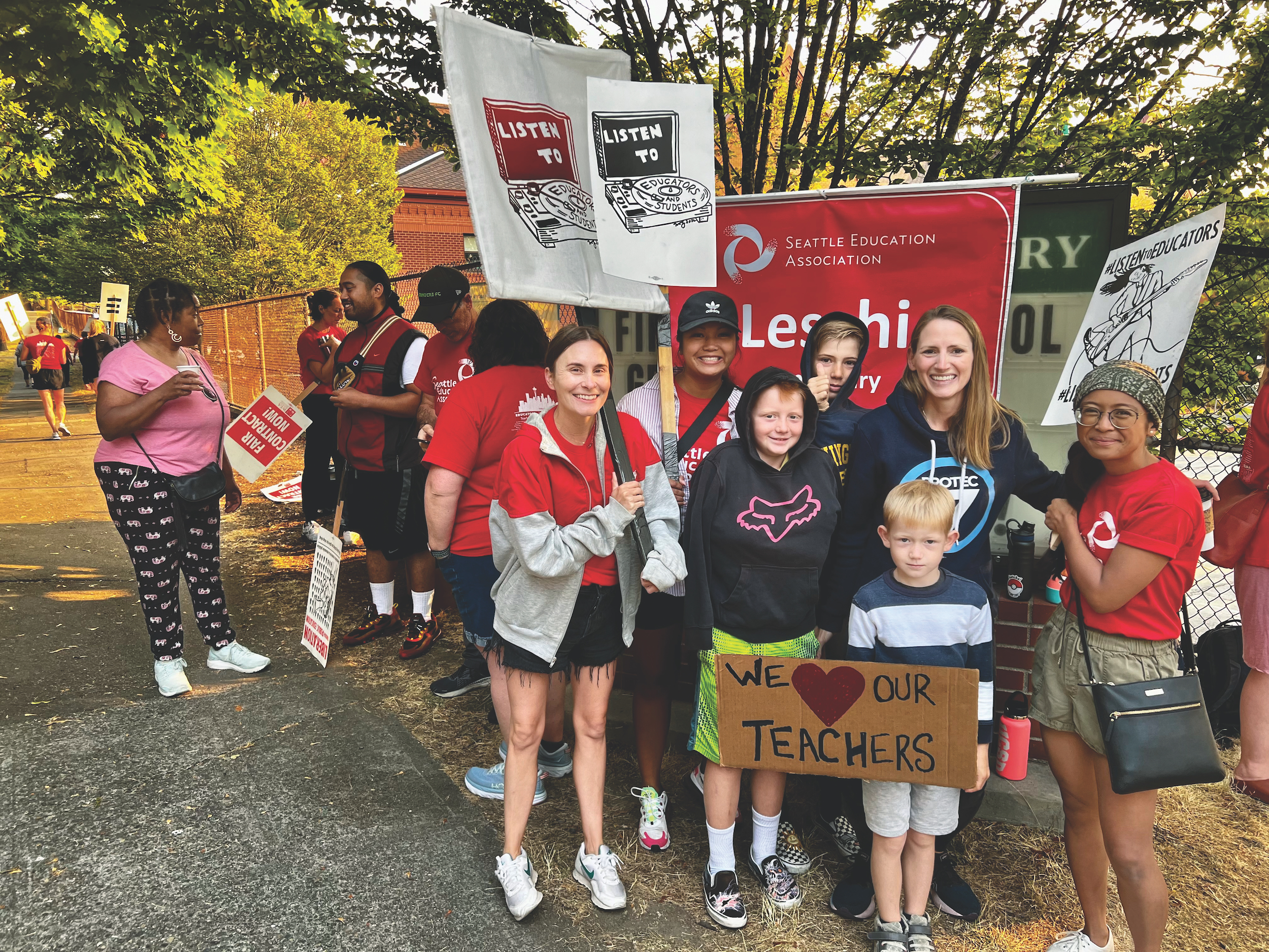 Photo of PROTEC17 Executive Director Karen Estevenin and family supporting Seattle teachers on the picket line in Sept. 2022